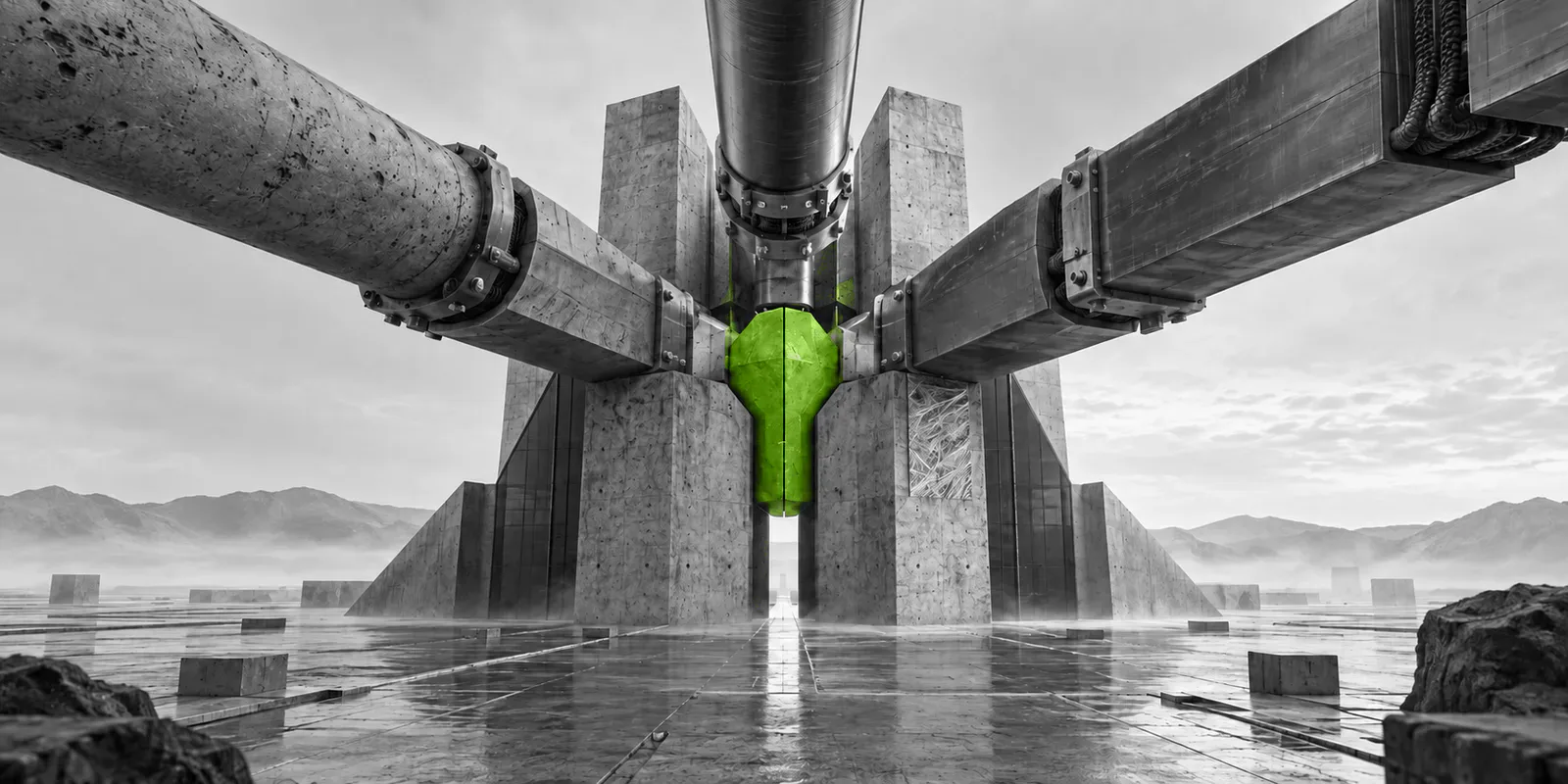 Tres conductos industriales convergen en una pieza verde que sostiene una estructura de hormigón y metal.
